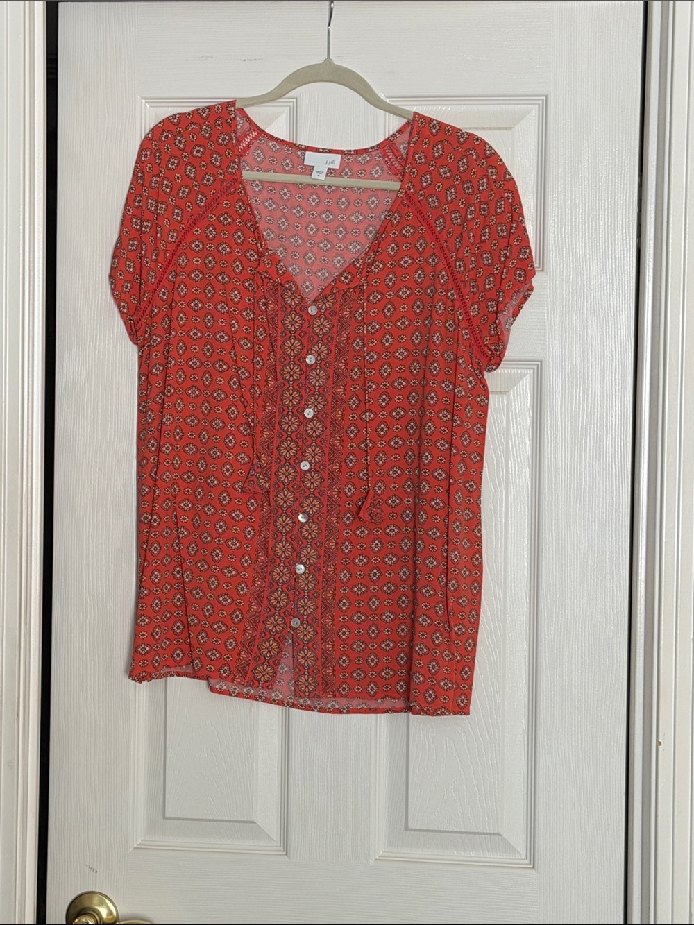 J. Jill coral  Geometric Ruffle-Front Short Sleeve Blouse with tassel ties